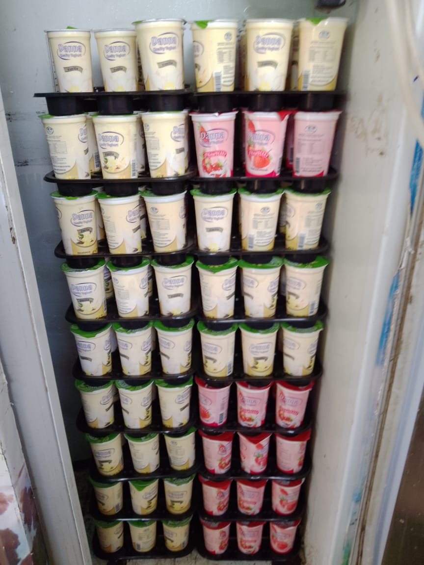 Display fridge full of Danna yoghurt cups